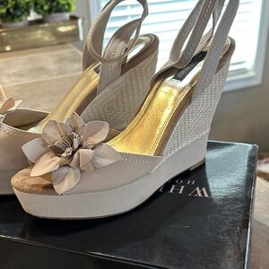 White House Black Market Beige Wedge Sandals with Floral Detail
Gently worn